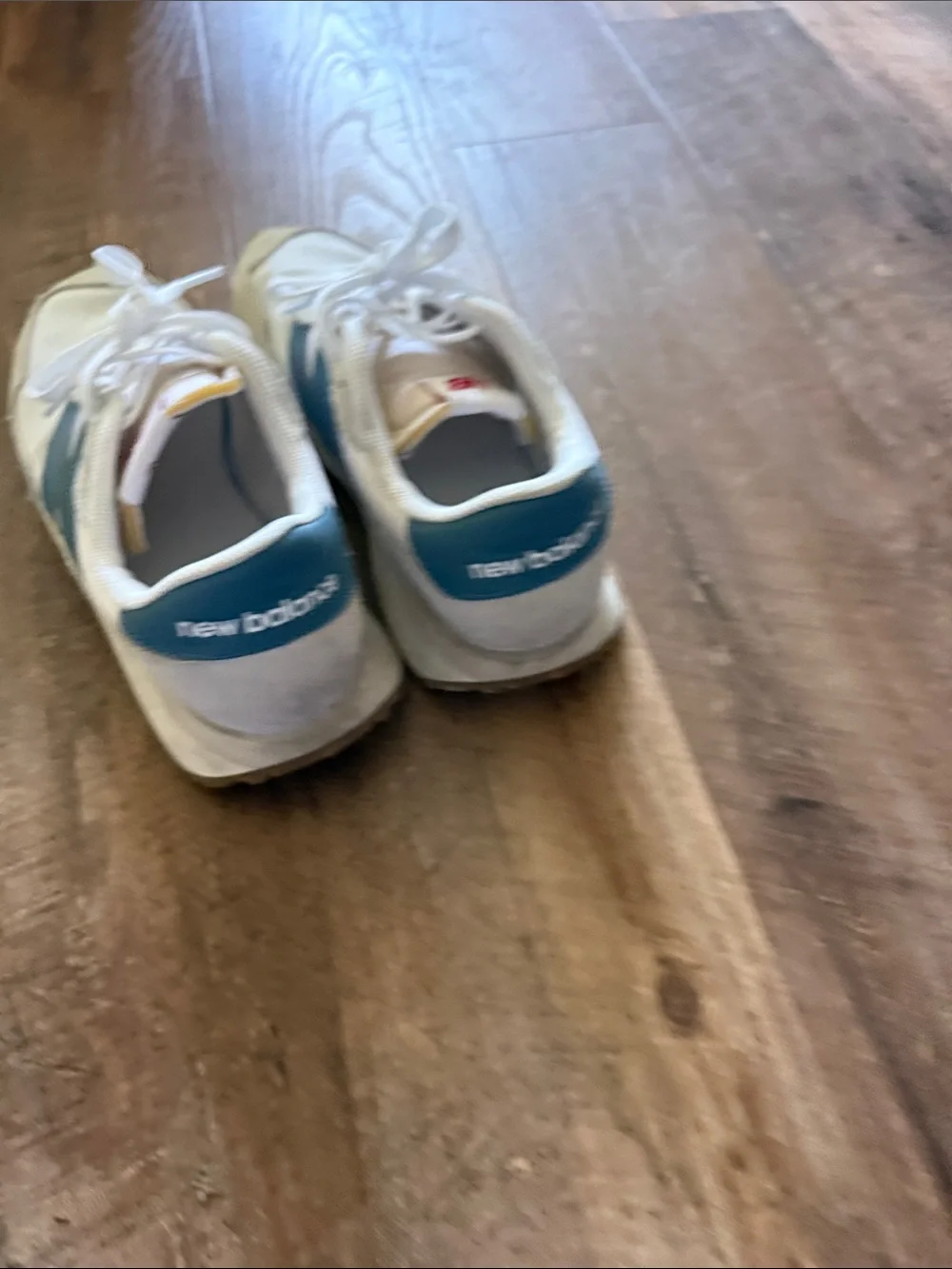 New Balance White Sneakers with Blue 'N' Logo